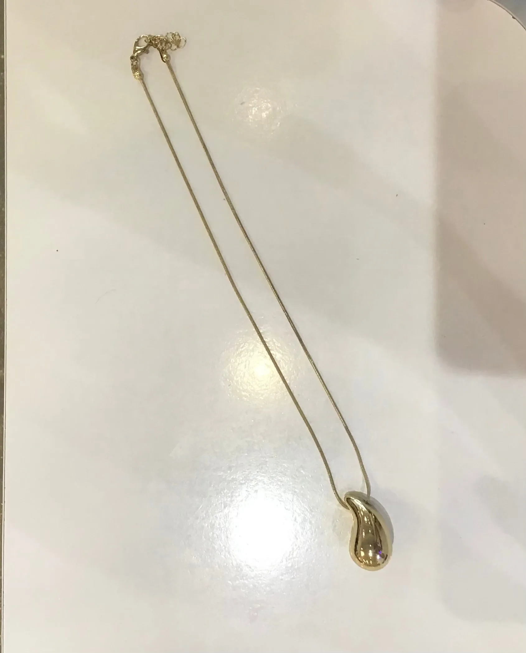 Dainty gold necklace with pendant