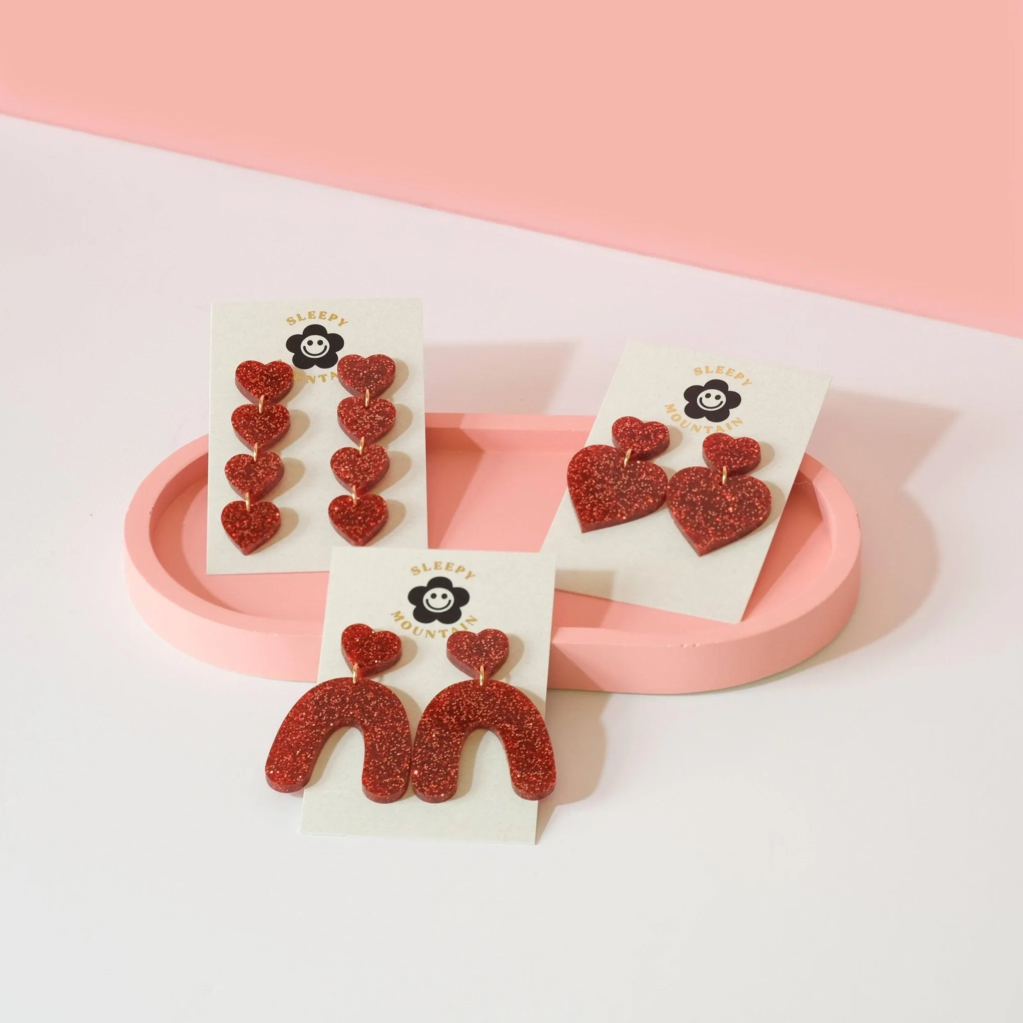 String of Hearts Dangle Earrings